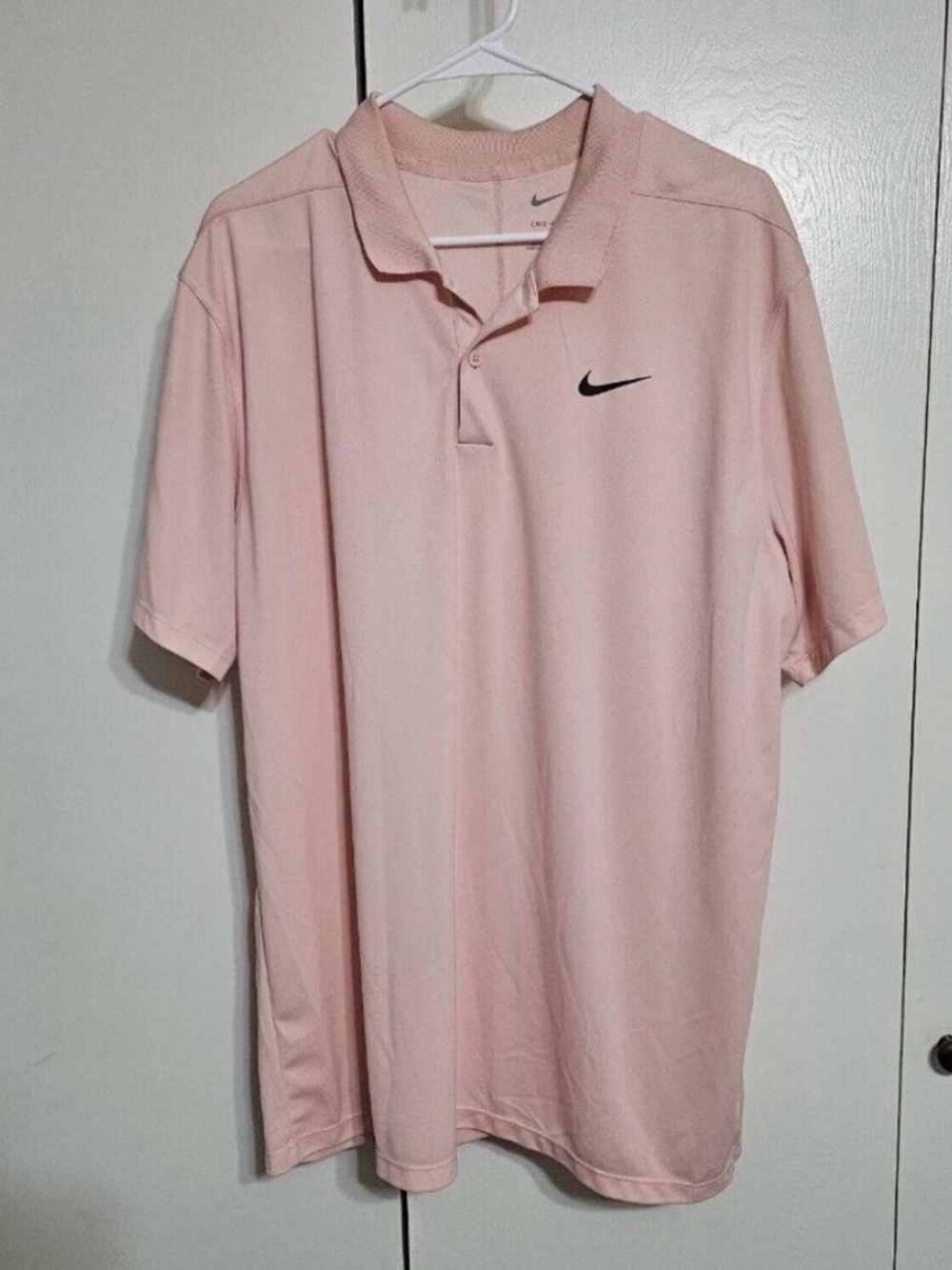 Nike Men's Light Pink Polo with Black Swoosh